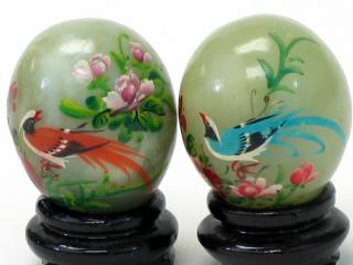 Appraisal: Pair of Chinese Painted Stone Eggs on Wood Stands Total