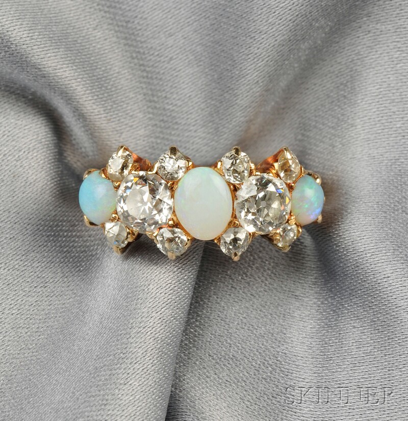 Appraisal: kt Gold Opal and Diamond Ring set with three cabochon