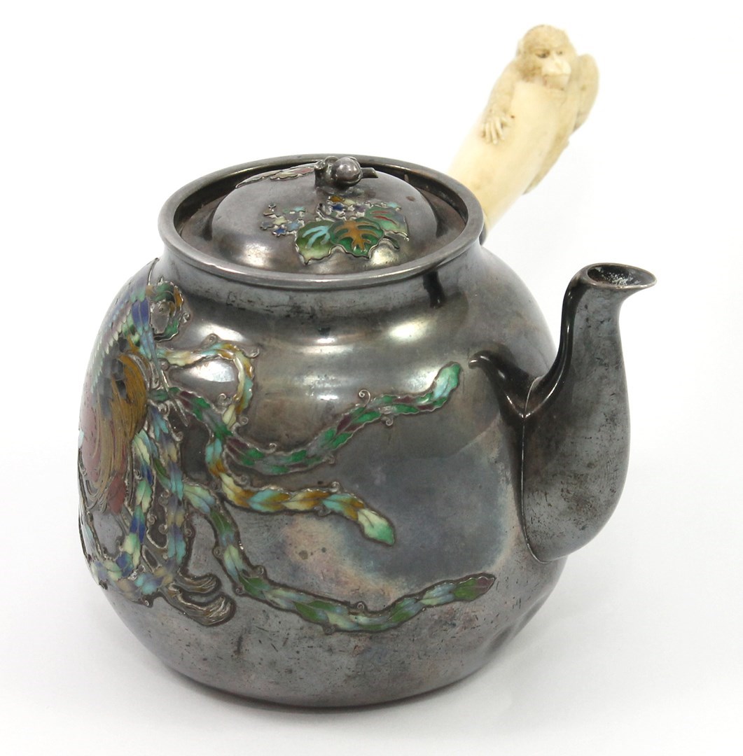 Appraisal: A Japanese silver and enamelled sake pot and cover Meiji