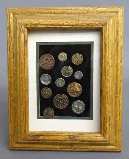 Appraisal: Framed collection of early LAW and wheelmen buttons Fair to