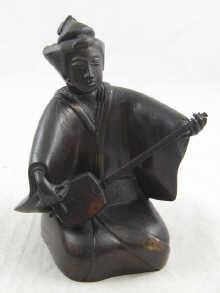 Appraisal: A th century Japanese bronze figure of a musician approx