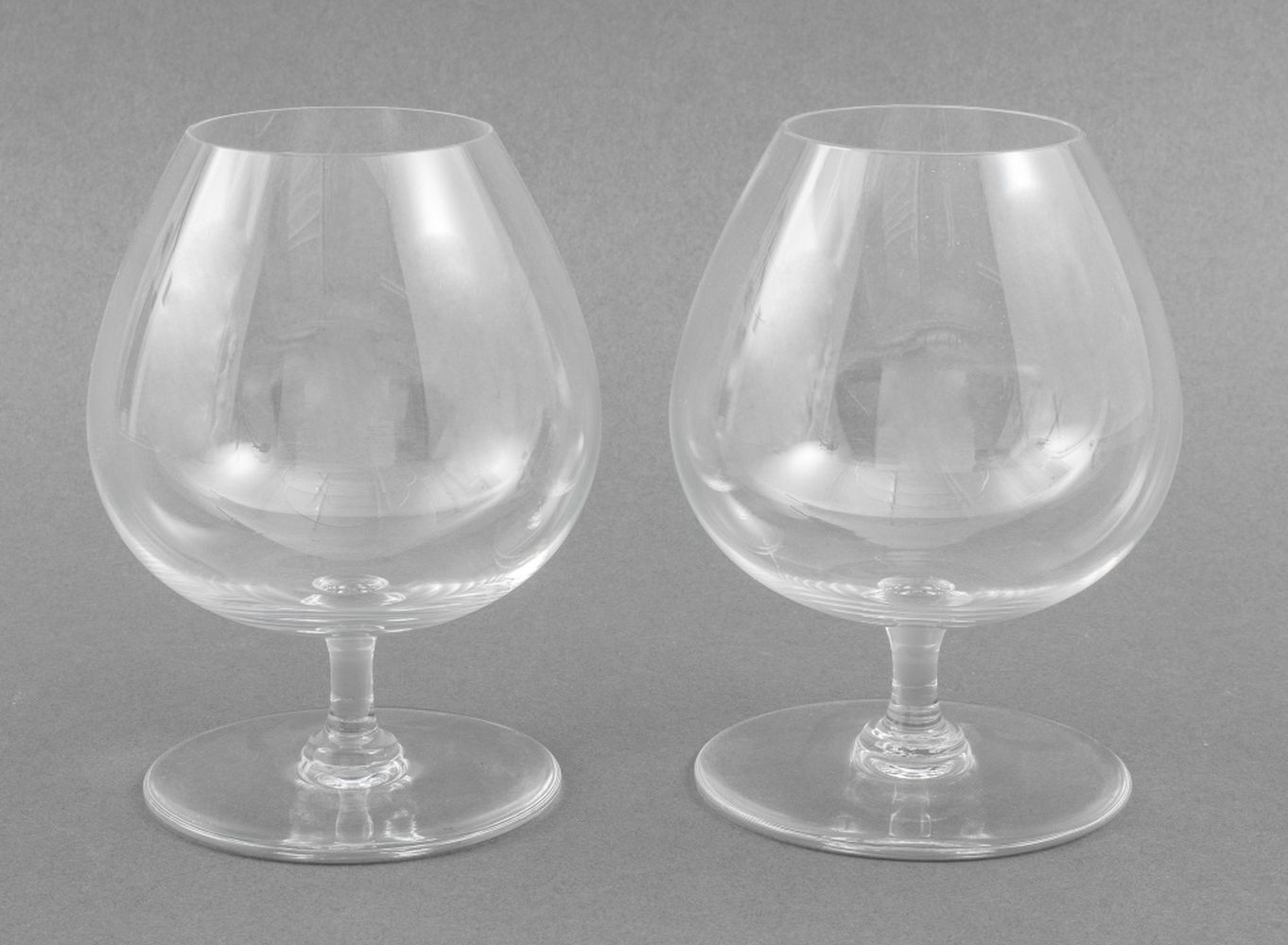 Appraisal: BACCARAT CRYSTAL SNIFTER GLASSES PAIR Pair of Baccarat crystal snifter