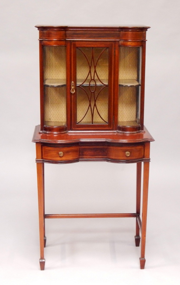 Appraisal: An Edwardian mahogany and boxwood line inlaid display cabinet the