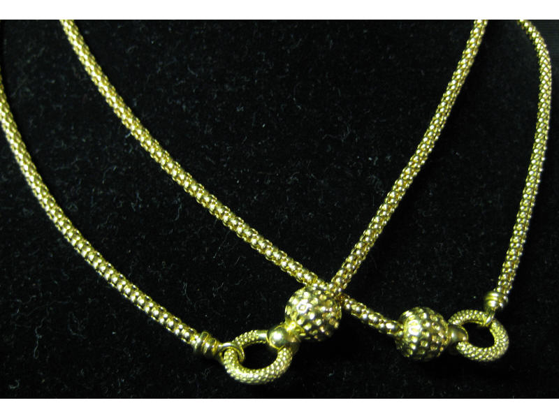 Appraisal: GOLD NECKLACE k yellow gold chain necklace with textured bead