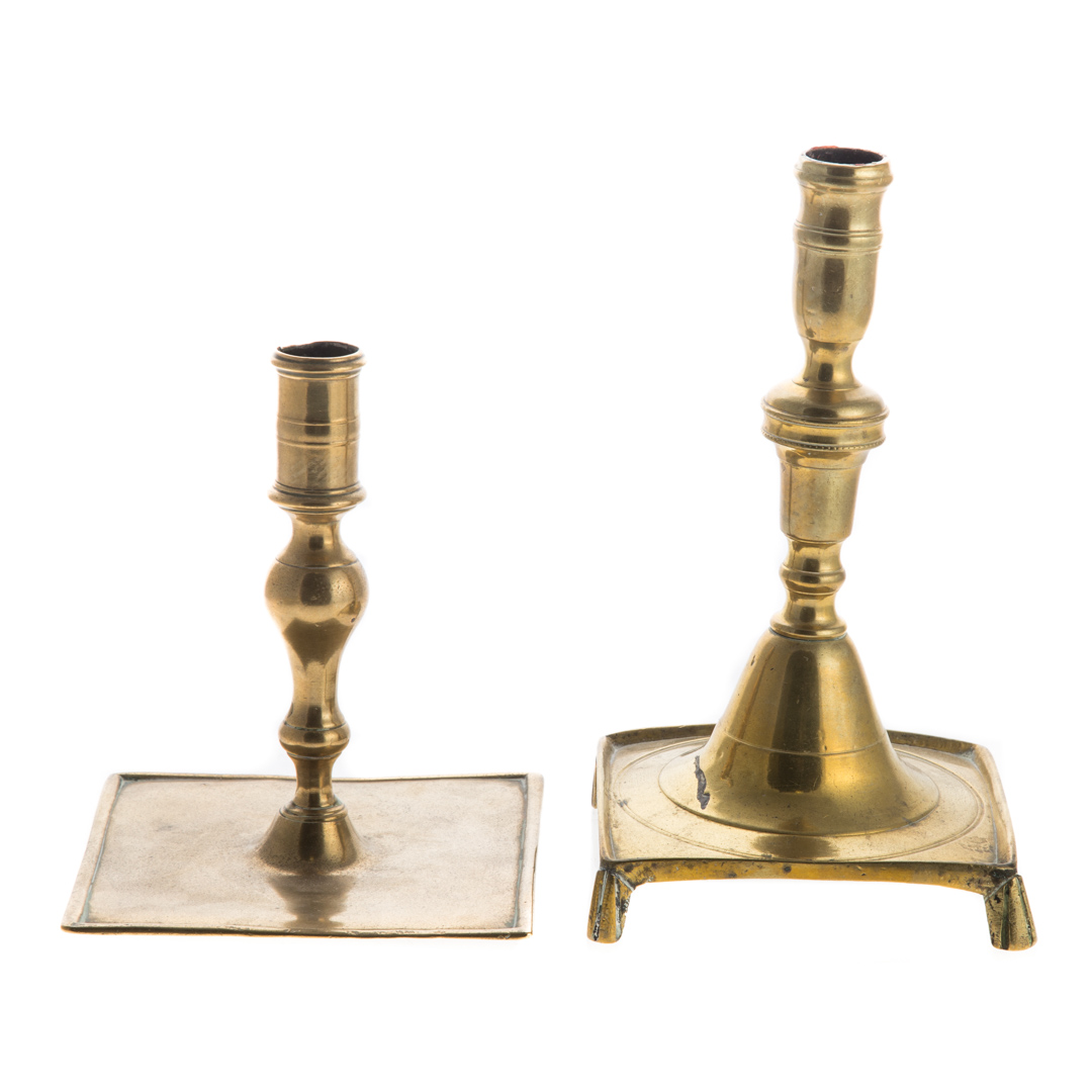 Appraisal: Two Spanish brass square based candlesticks mid- th century brush