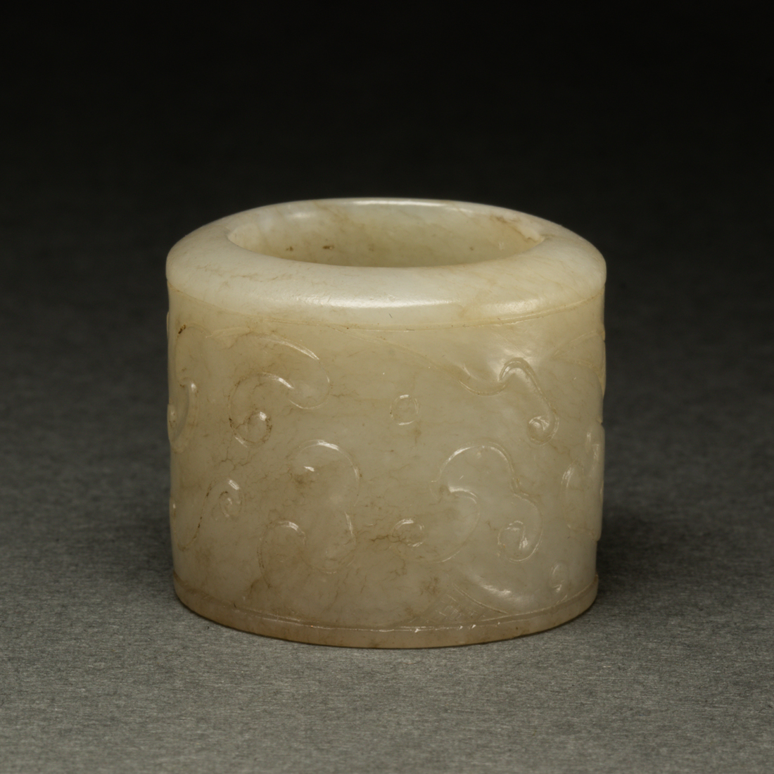 Appraisal: CHINESE WHITE JADE ARCHER'S RING Chinese white jade archer's ring