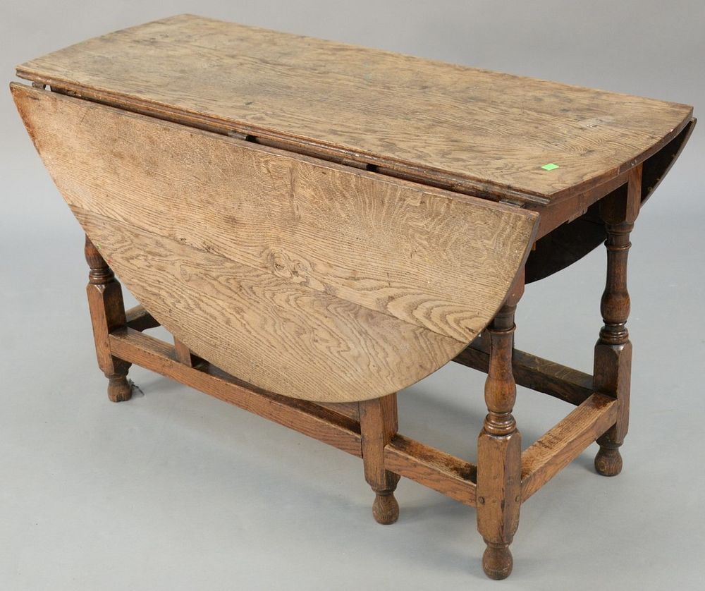 Appraisal: Jacobean oak gate leg drop leaf table with drawers restored