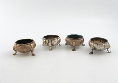 Appraisal: A matched set of four circular salt cellars two by