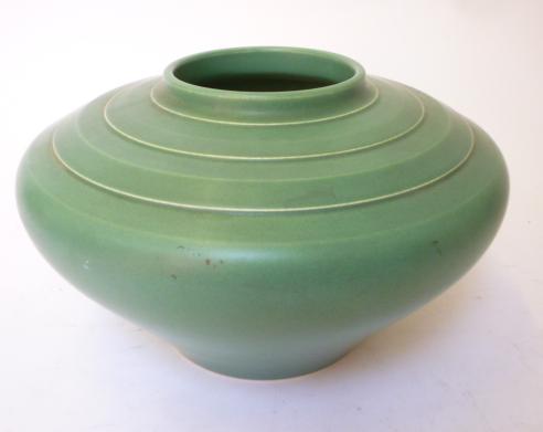 Appraisal: A KEITH MURRAY WEDGWOOD GREEN GLAZED EARTHENWARE VASE mid th