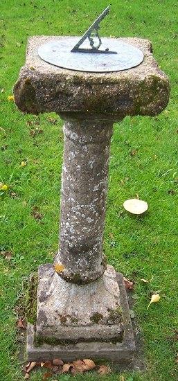 Appraisal: A sundial on a stone column and square base cm