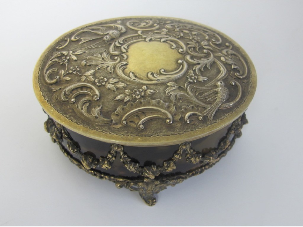 Appraisal: A silver gilt and tortoiseshell oval box the hinged cover