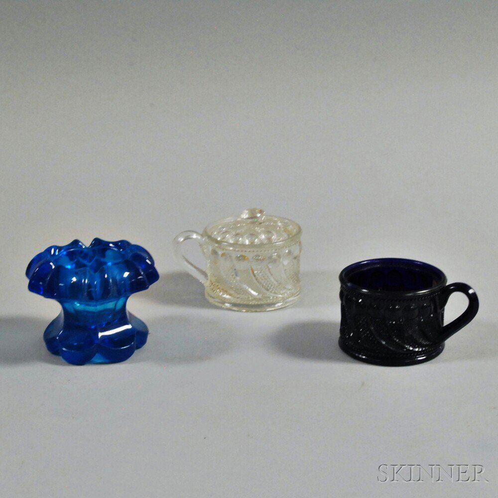 Appraisal: Three Pressed Glass Table Items th century two peacock eye