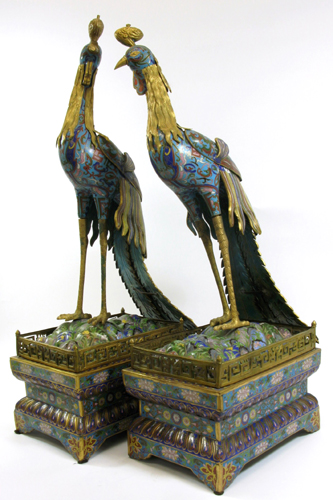 Appraisal: PAIR CLOISONNE ENAMEL METAL EXOTIC LONG-TAILED BIRDS The blue diapered