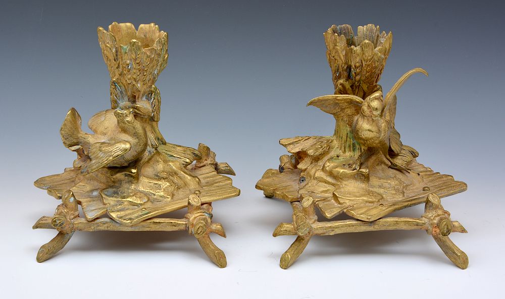 Appraisal: Pair of low bronze candlesticks with birds wood and wheat