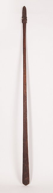 Appraisal: A MAORI TAIAHA CEREMONIAL SPEAR with stylised carving and mask