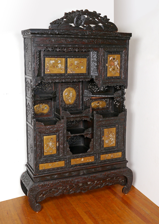 Appraisal: PROFUSELY CARVED JAPANESE CABINET ETAGERE Bird of paradise crest inset