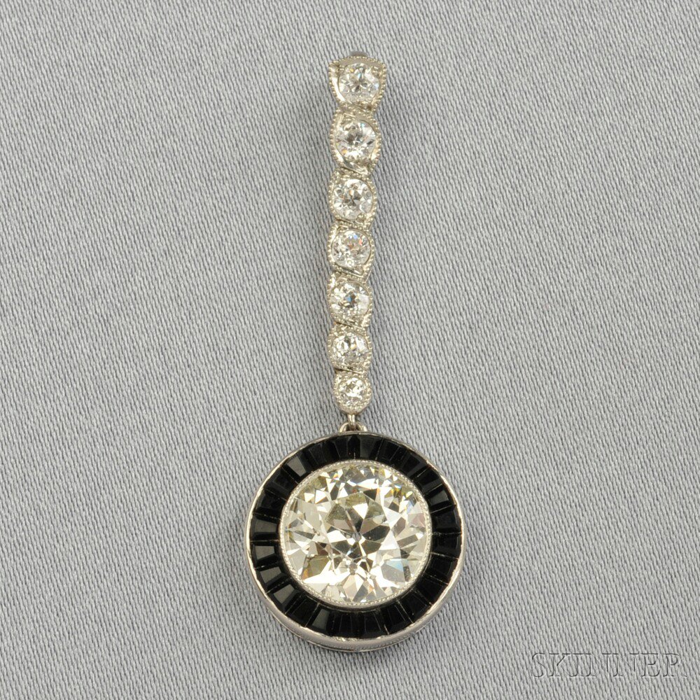 Appraisal: Art Deco Platinum and Diamond Pendant bezel-set with an old