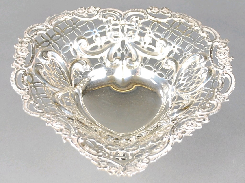 Appraisal: VICTORIAN SILVER PIERCED AND EMBOSSED HEART SHAPED BOWL of heavy