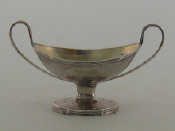 Appraisal: A George III Scottish silver boat-shaped salt on pedestal foot