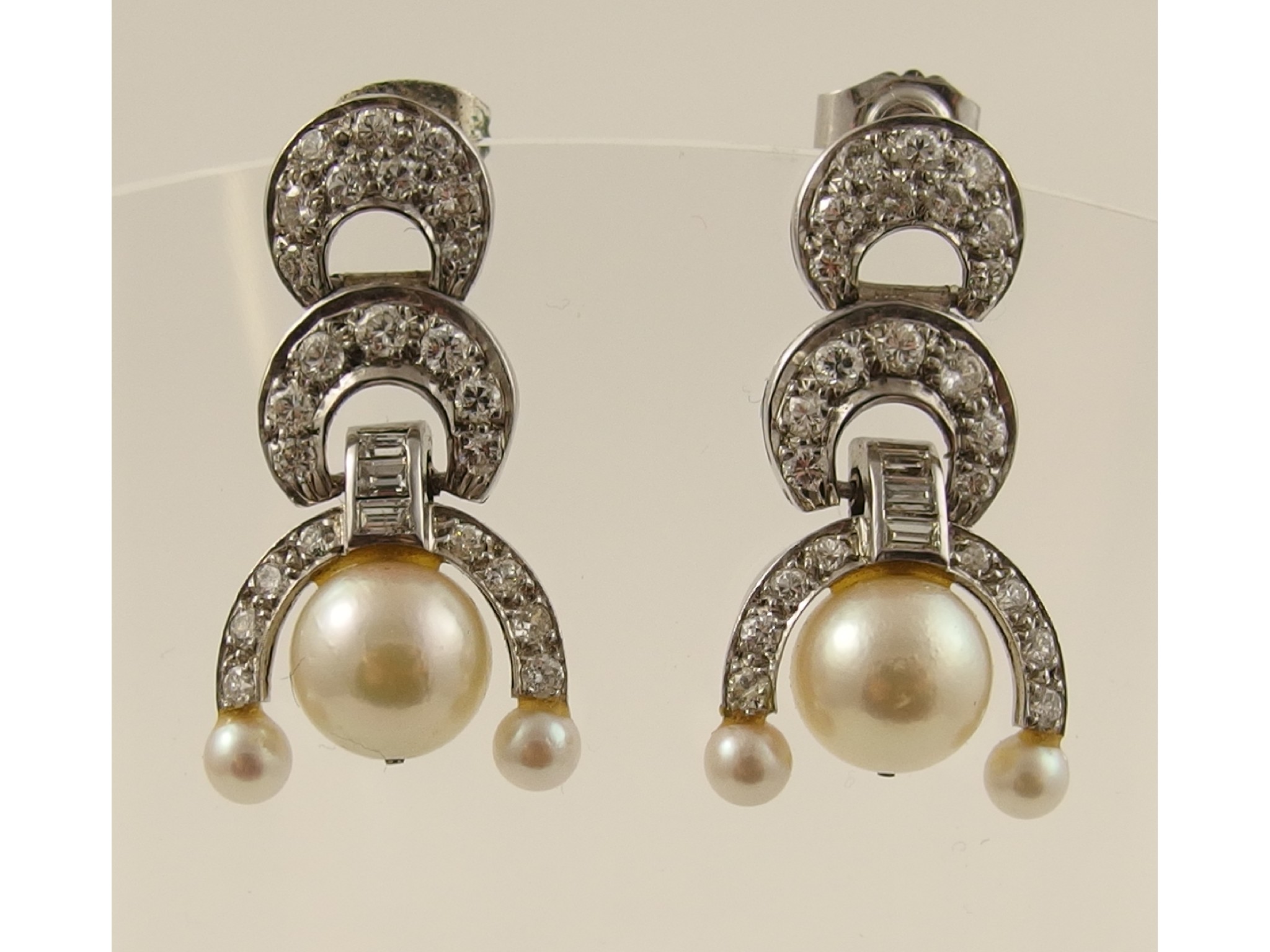 Appraisal: A pair of Art Deco earringsdiamonds pave set to the