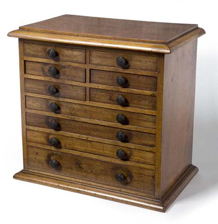 Appraisal: A Victorian walnut specimen chest circa the moulded rectangular top