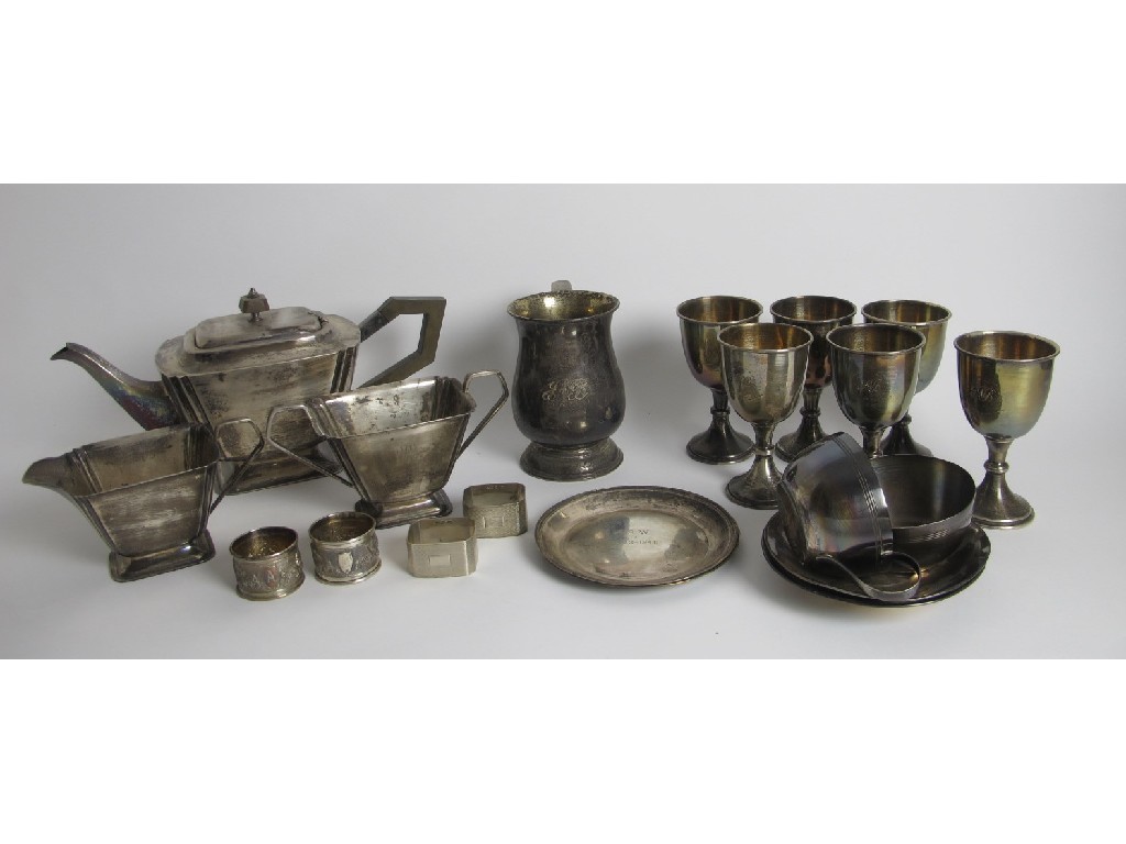 Appraisal: An Indian white metal tankard of baluster form with scroll