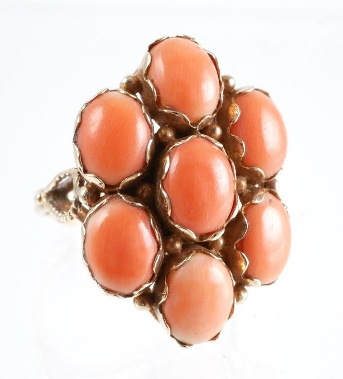 Appraisal: pink coral oval cabochons set in a K yellow gold