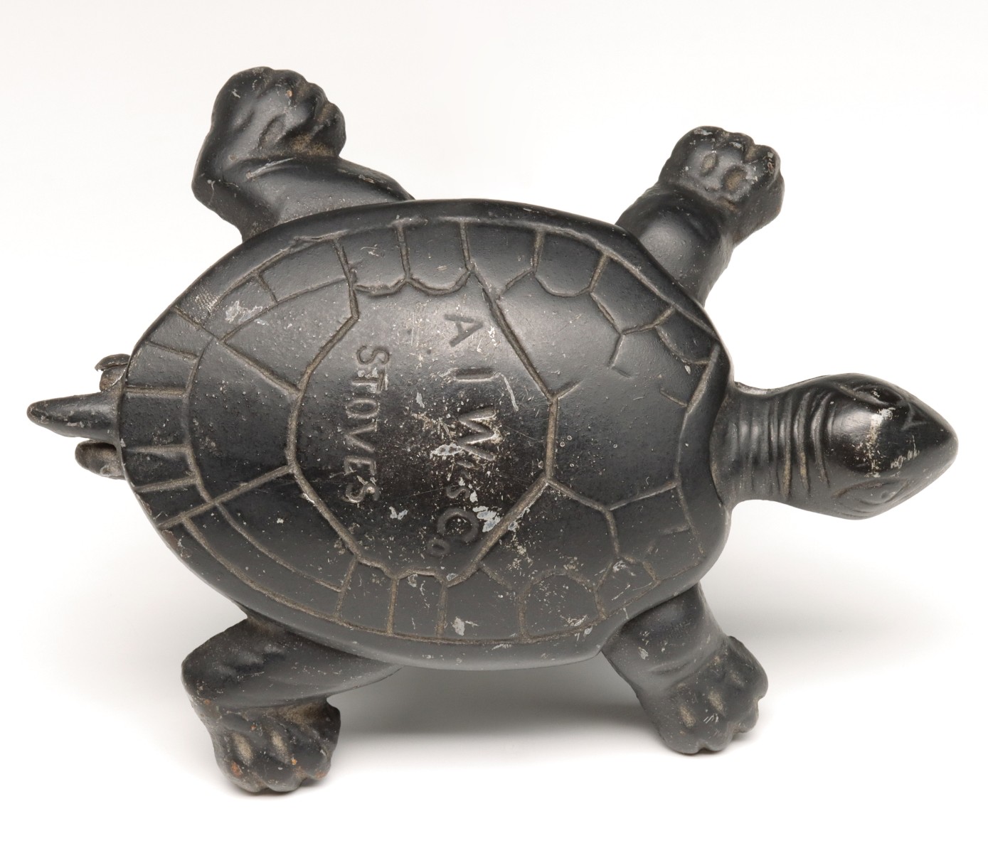 Appraisal: IRON TURTLE STOVE ADVERTISING MATCH SAFE C Impressed lettering on