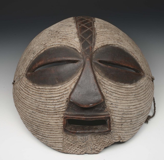 Appraisal: AN AFRICAN CARVED TRIBAL MASK with painted decoration and another