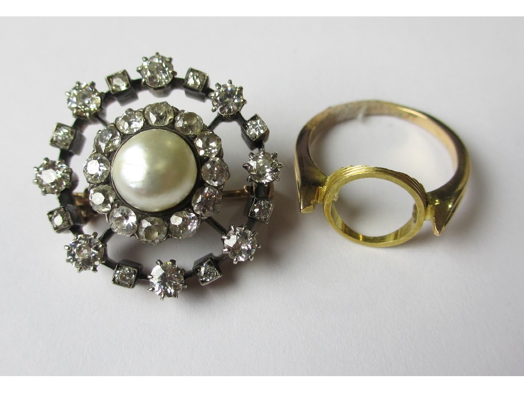 Appraisal: A Victorian gold and silver diamond and pearl target brooch