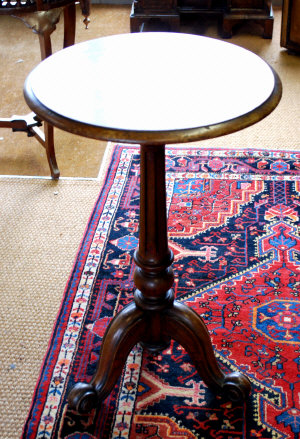 Appraisal: Victorian mahogany tripod table the circular top raised on a