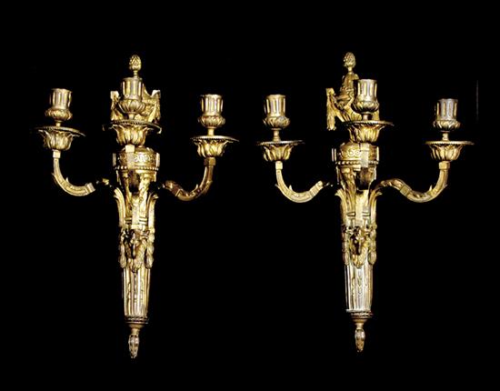 Appraisal: Pair French gilt-bronze three-light sconces late th centuryurn and garland