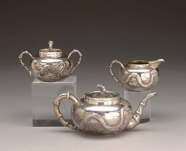 Appraisal: A late Chinese export silver three piece tea setZee-Wo amp