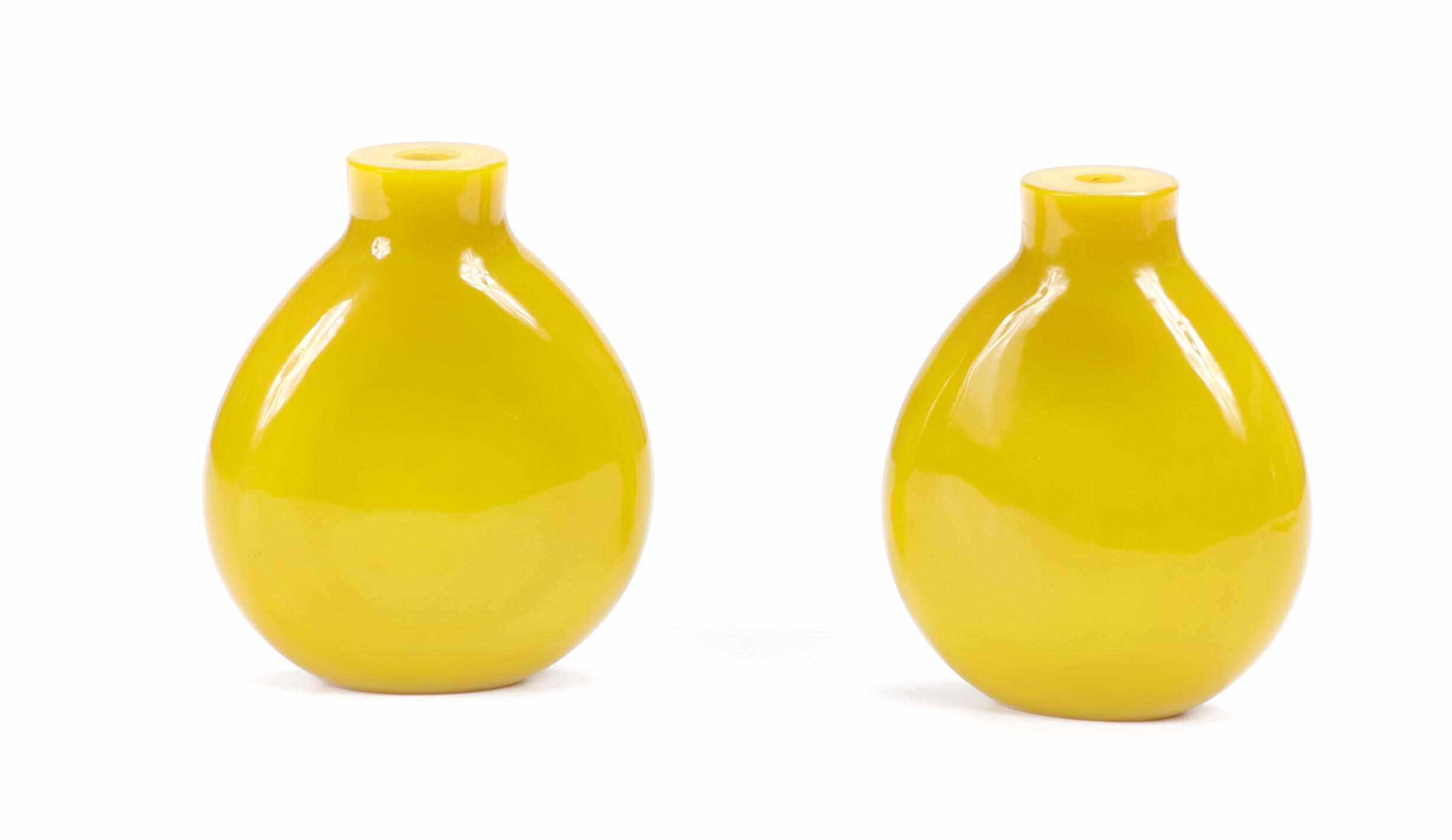 Appraisal: A pair of yellow Peking glass vases height in width