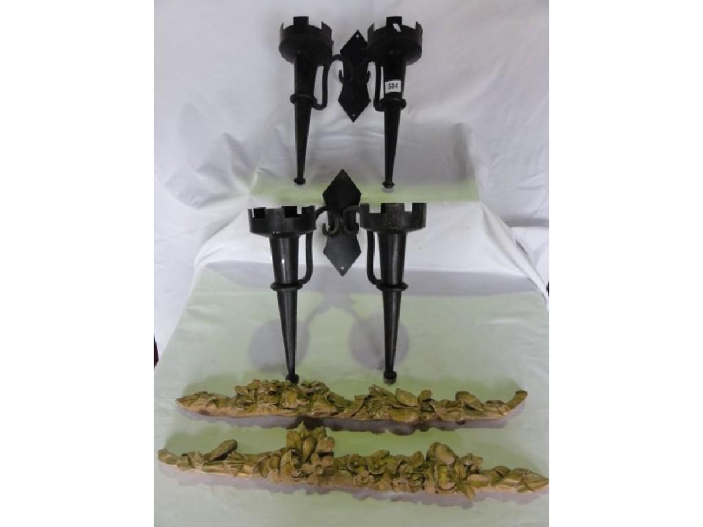 Appraisal: Two pairs of ironwork wall mounted candle holders in the