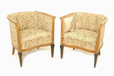 Appraisal: A pair of late th century continental beechwood tub armchairs