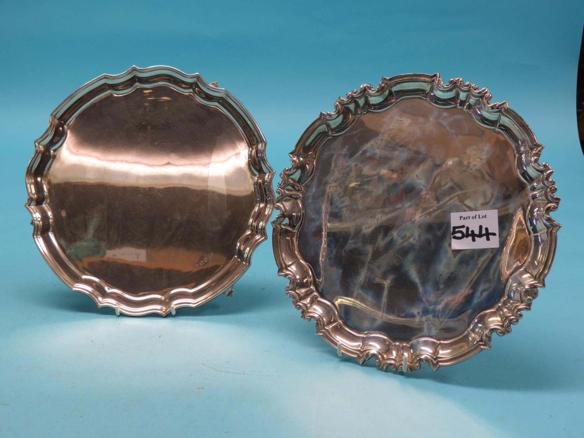 Appraisal: A silver salver circular-shape with pie-crust border on three knurled