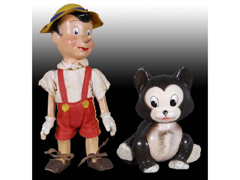 Appraisal: Wood Pinocchio Composition Figaro the Cat Dolls Description Figaro ''