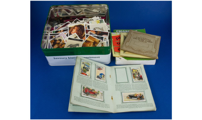 Appraisal: Over one thousand cigarette cards and valuation books