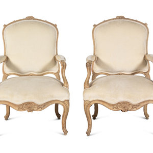 Appraisal: A Pair of Louis XV Style Bleached Wood Fauteuils th