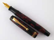 Appraisal: A Parker Duofold fountain pen in shades of black and