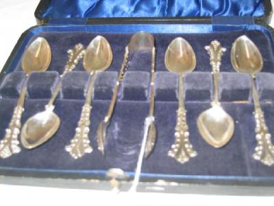 Appraisal: A SET OF SIX TEASPOONS and a matching pair of