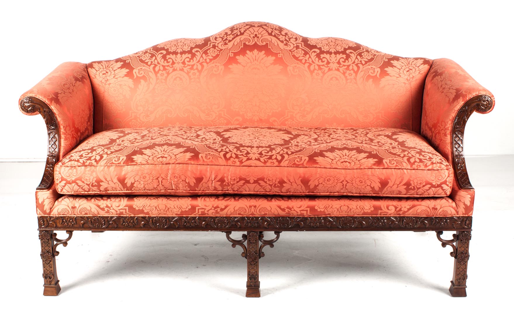 Appraisal: Baker Chinese Chippendale style mahogany sofa camelback blind-fret carved legs