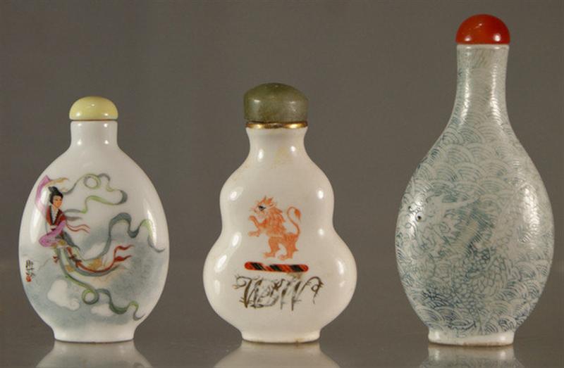 Appraisal: porcelain snuff bottles various shapes designs jade carnelian stoppers th