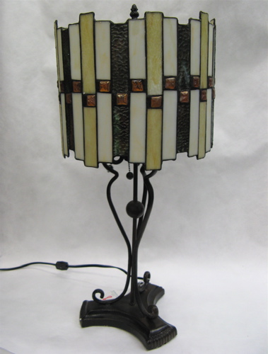 Appraisal: AN ARTS AND CRAFTS TABLE LAMP The circular stained and