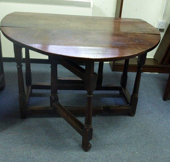 Appraisal: An th Century oak gateleg table the rectangular top with