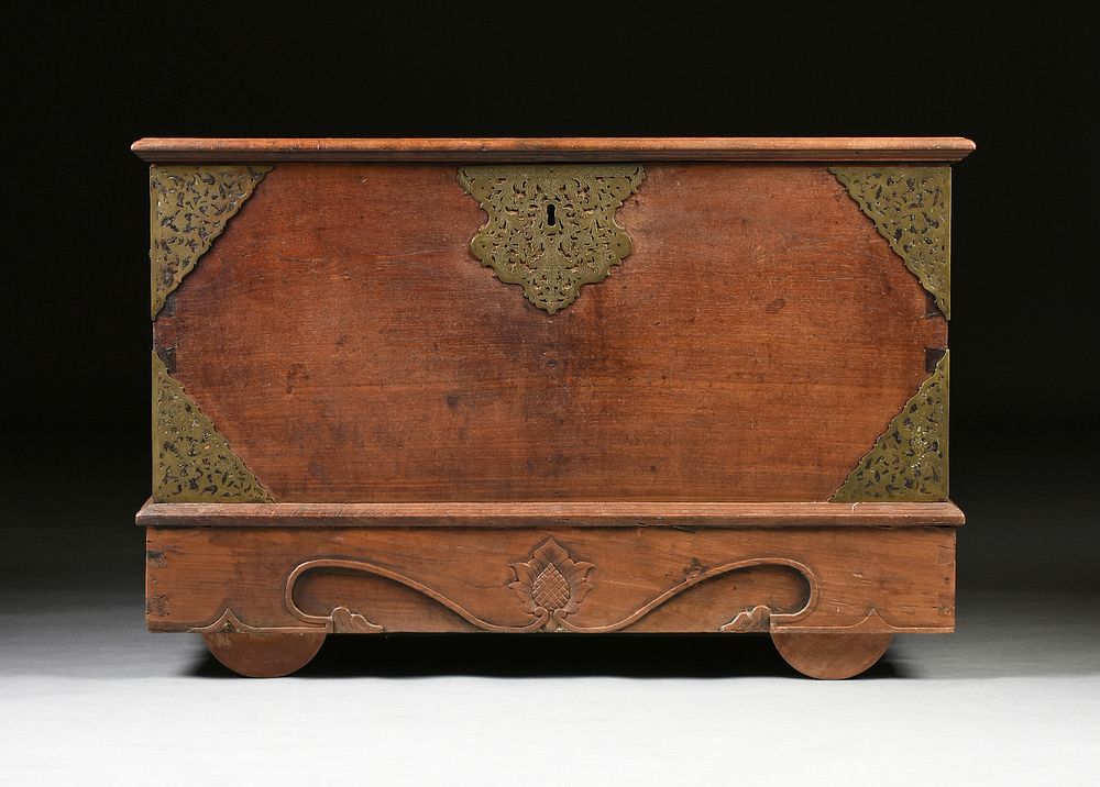 Appraisal: A LARGE INDIAN BRONZE MOUNTED AND CARVED HARDWOOD STORAGE CHEST