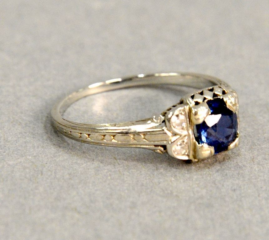 Appraisal: karat white gold ring with blue stone possibly sapphire karat