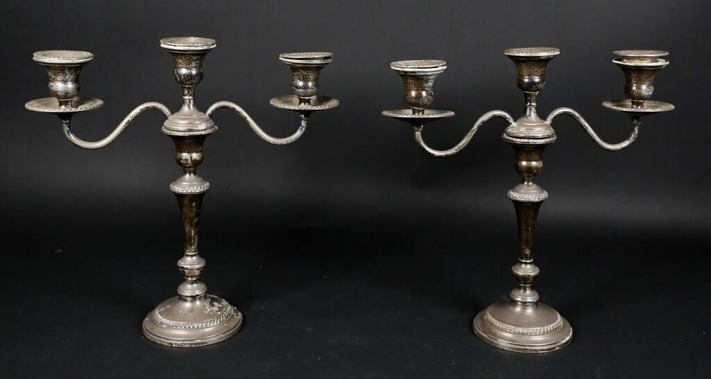 Appraisal: Pair of weighted sterling silver candelabras Marked on the underside