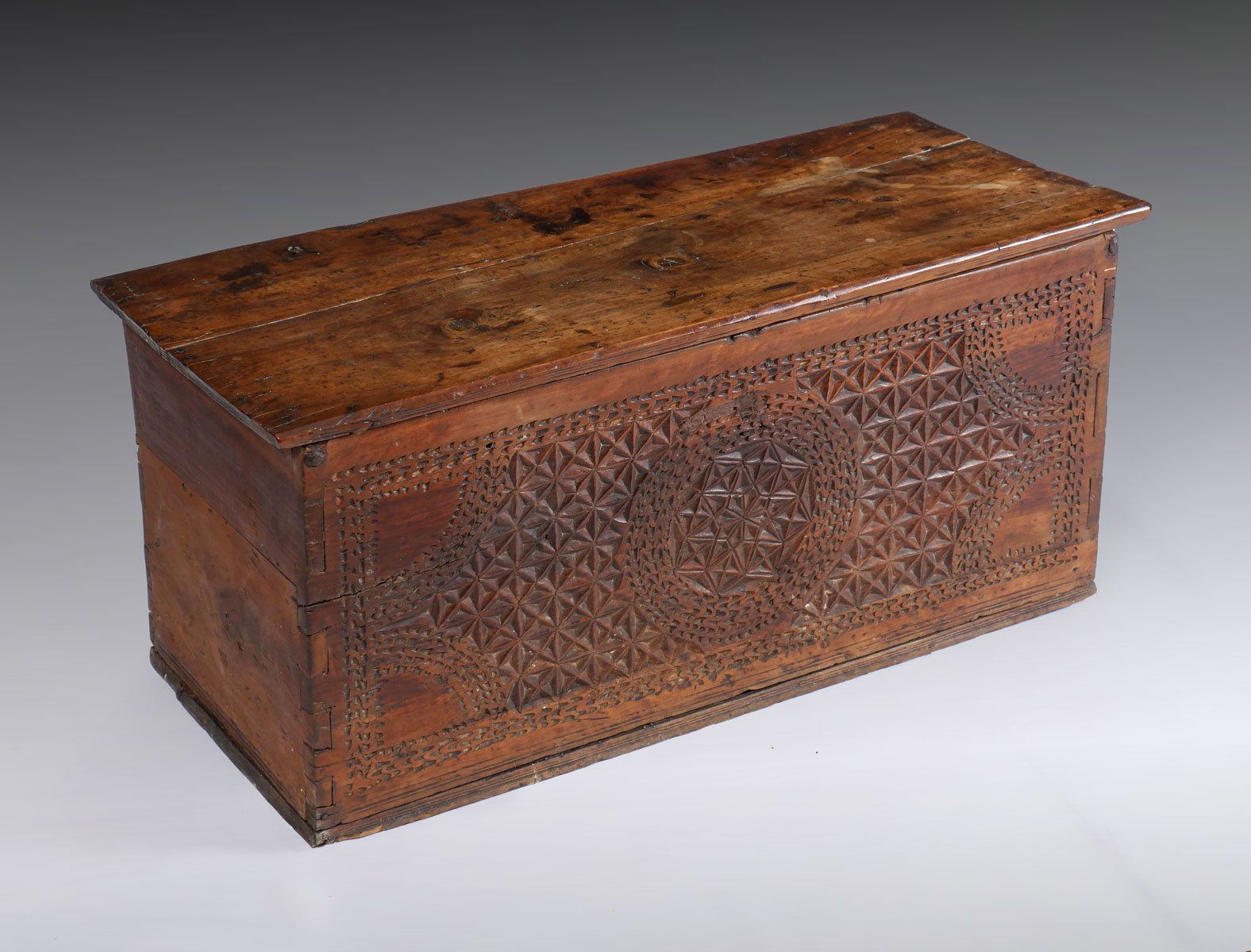 Appraisal: EARLY CARVED SYRIAN TRUNK Old Syrian chest having a carved